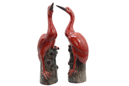 Paire d'échassiers en céramique émaillée